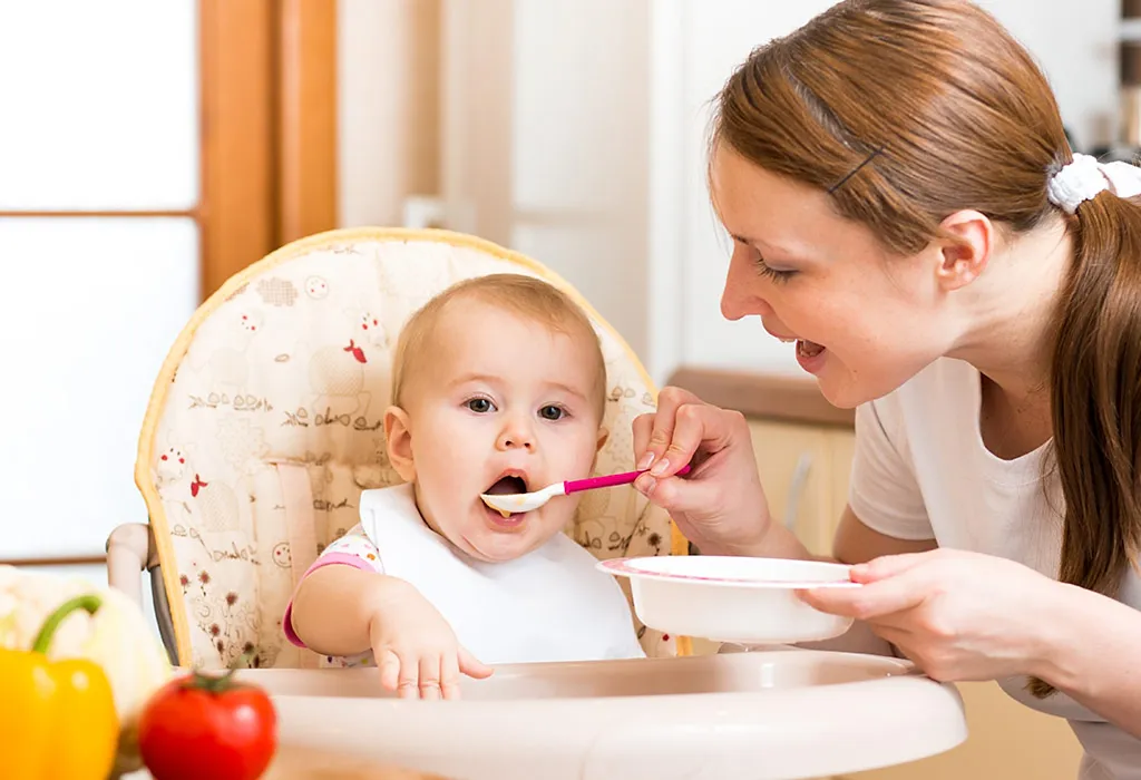 Mother feeding baby