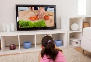 Kid Learning Cooking by TV