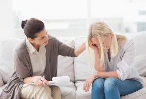 Woman taking session with therapist