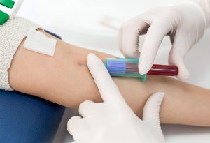 Woman undergoing blood test