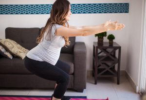 Pregnant women doing squats
