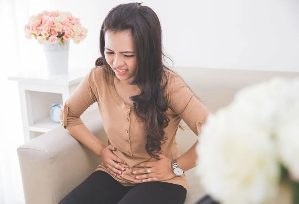 Woman suffering from indigestion