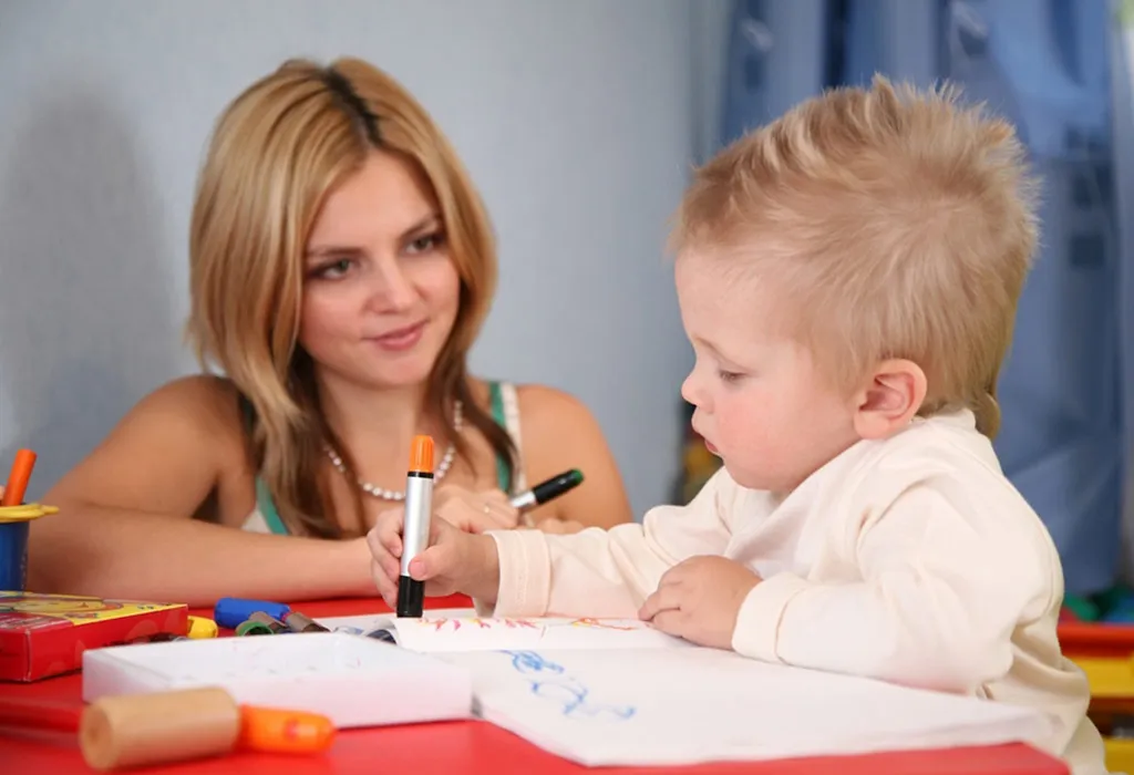 mother painting with son