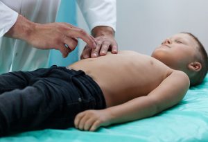 Child with Doctor for diagnosis