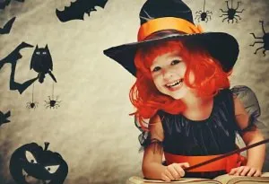 A girl dressed as a witch