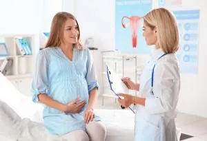 Pregnant Woman at doctors'
