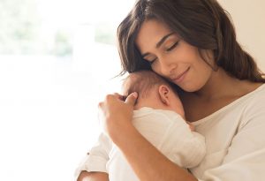Mother with newborn baby