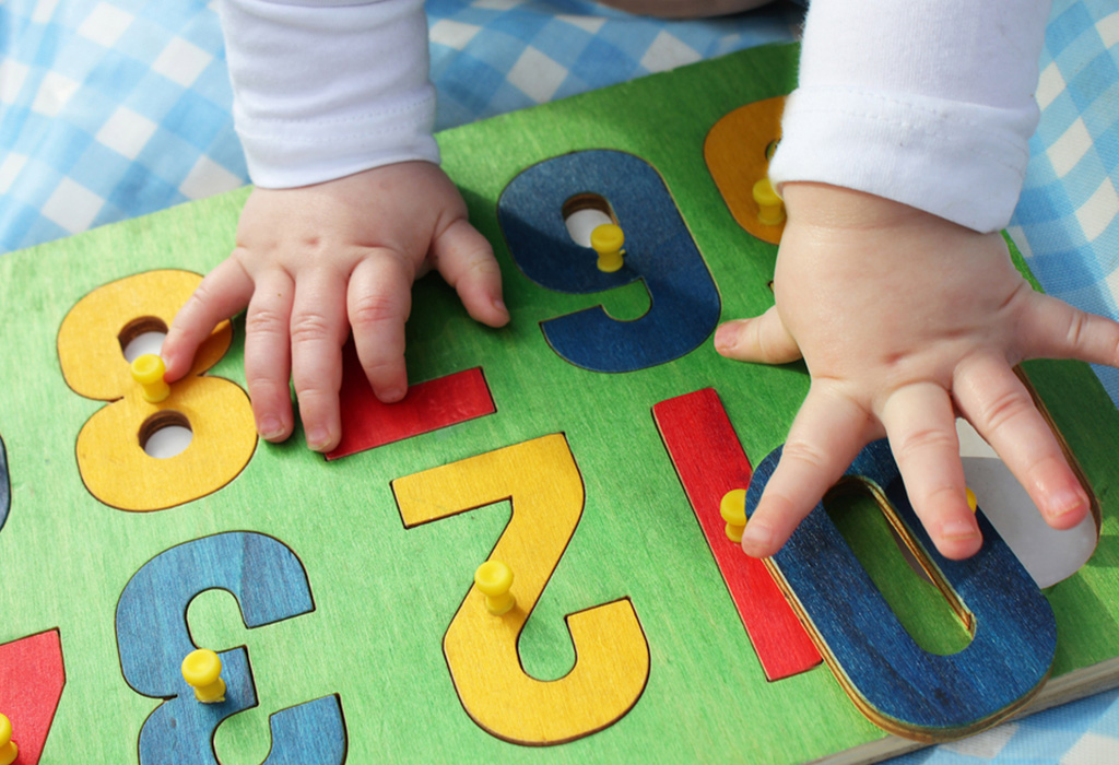 Child playing with numbers