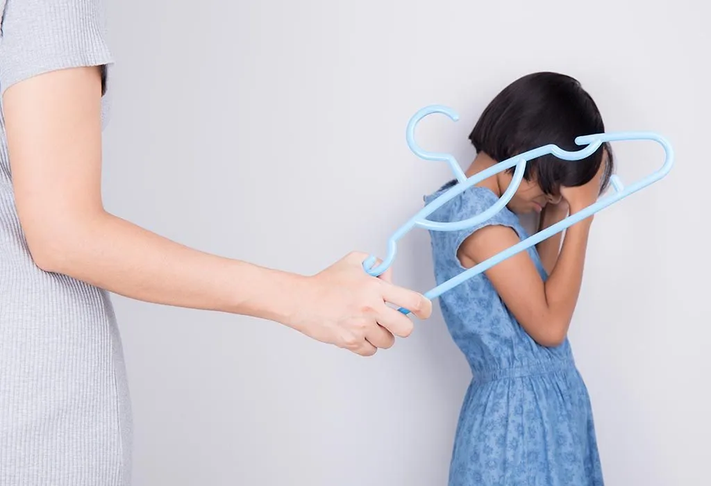 Woman spanking a child