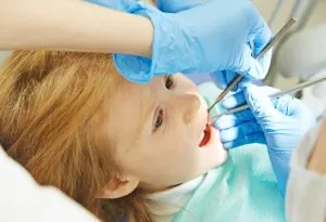 A little girl at a dental clinic