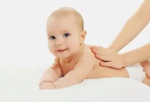Baby getting back massage