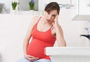 A pregnant woman with morning sickness