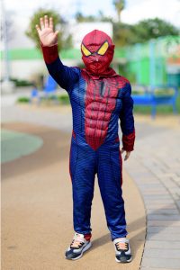 A little boy dressed as Spiderman