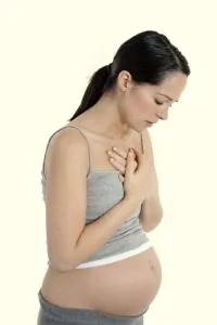 A pregnant woman experiencing chest pain