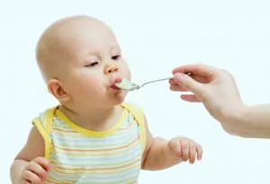 Feeding a baby with a spoon
