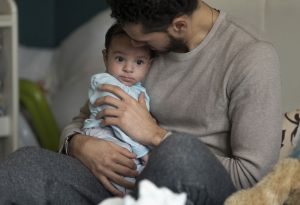 Father trying to get baby to sleep