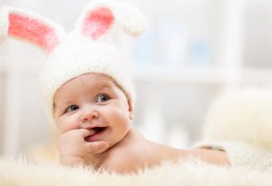 Image of Baby Smiling with Bunny Hat 