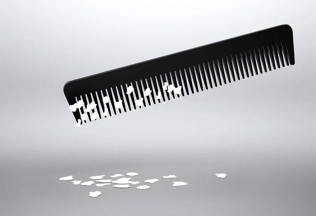 PAPER BITS ATTRACTED TO COMB