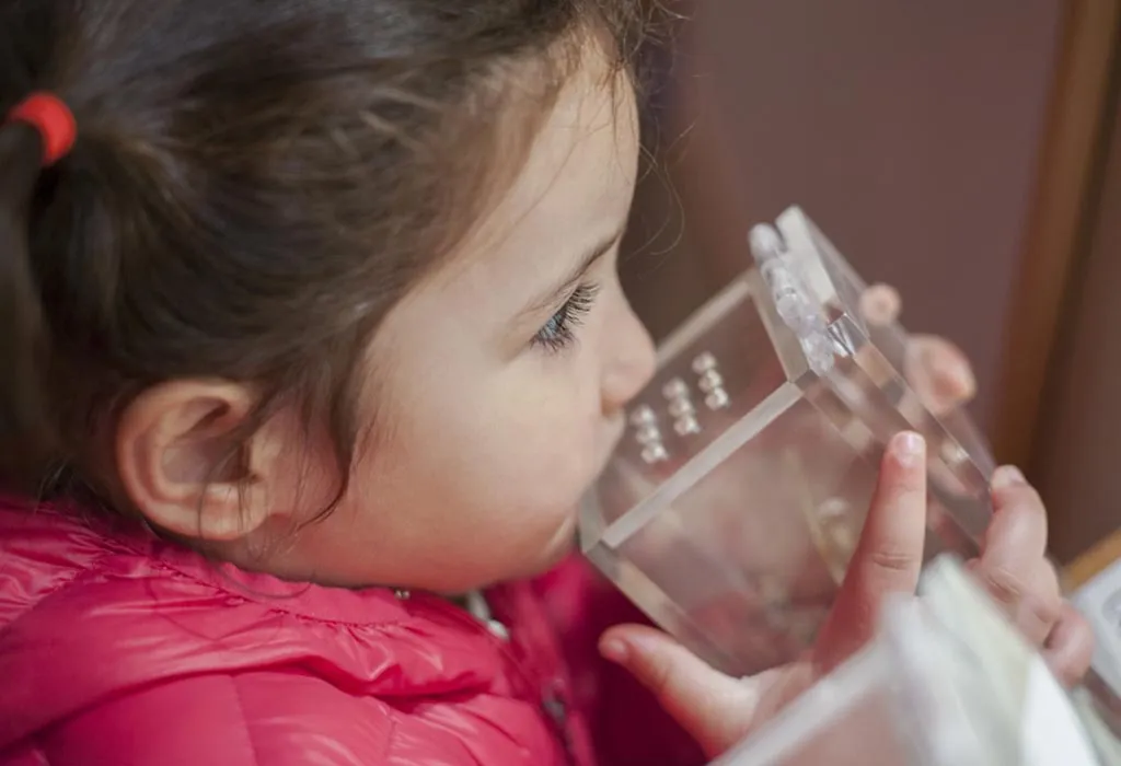 A girl testing her sense of smell