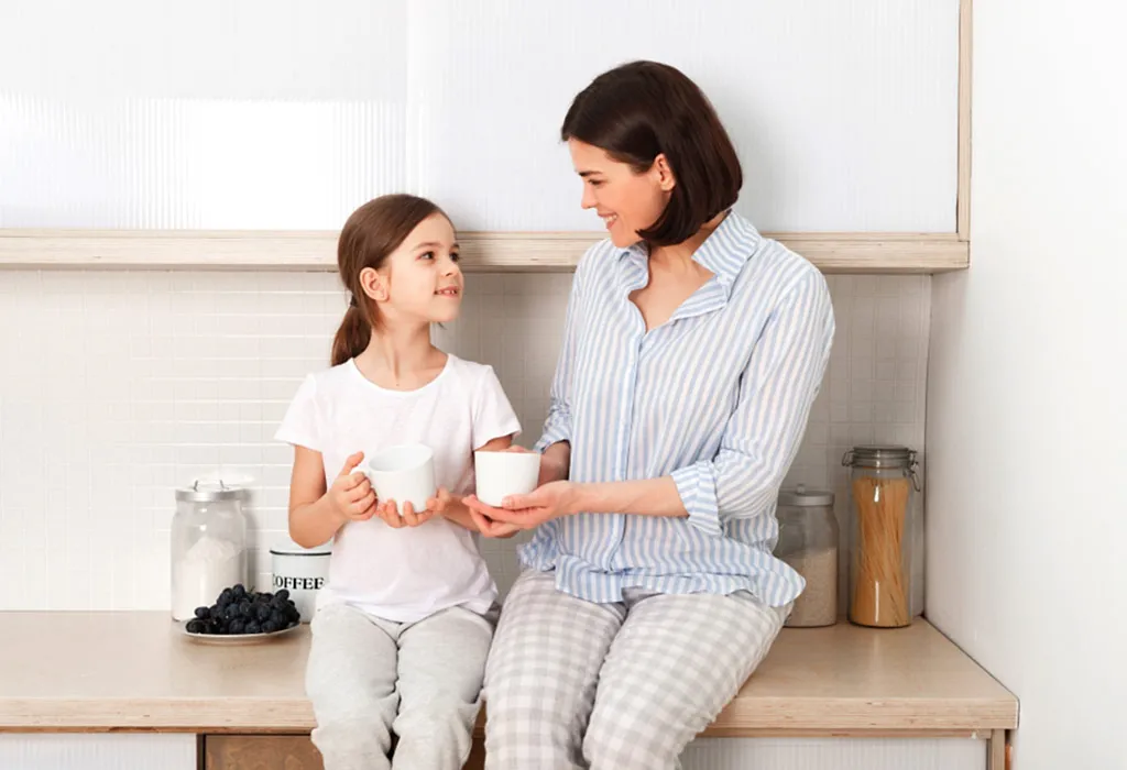 mother and girl talking