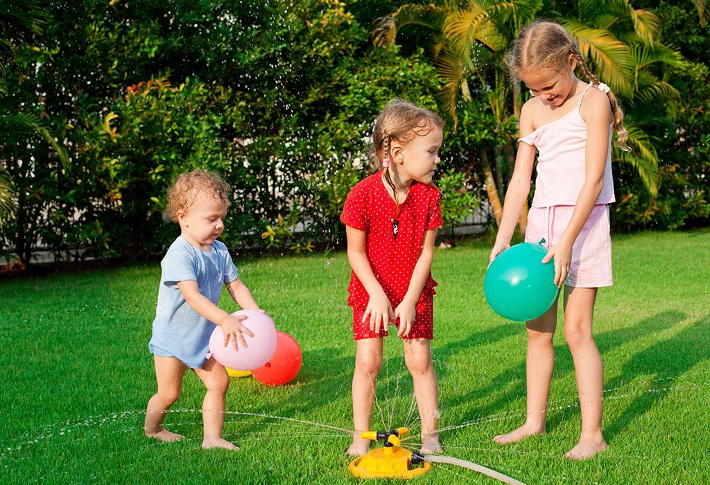 Kids playing with water balloon
