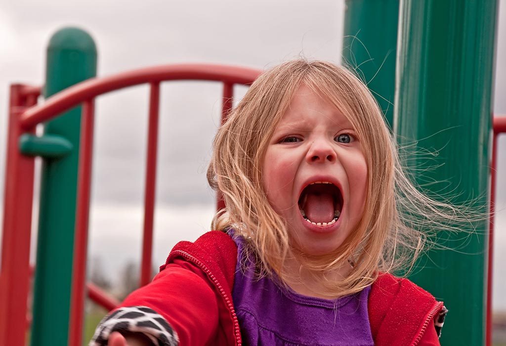 A 4-year-old girl angry and crying