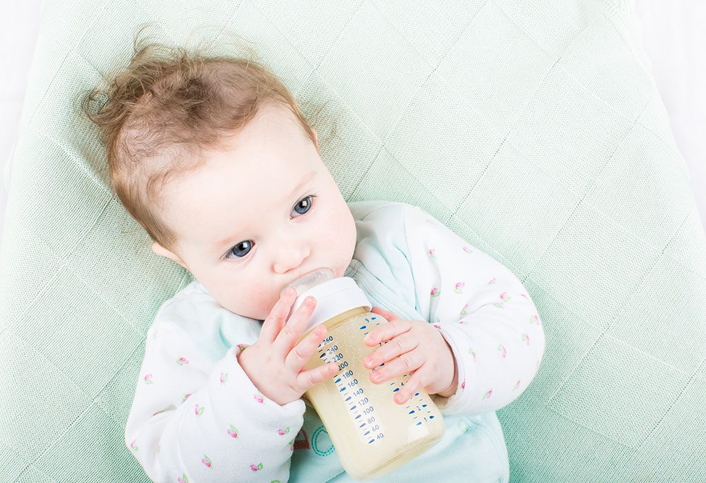 A baby drinking formula milk