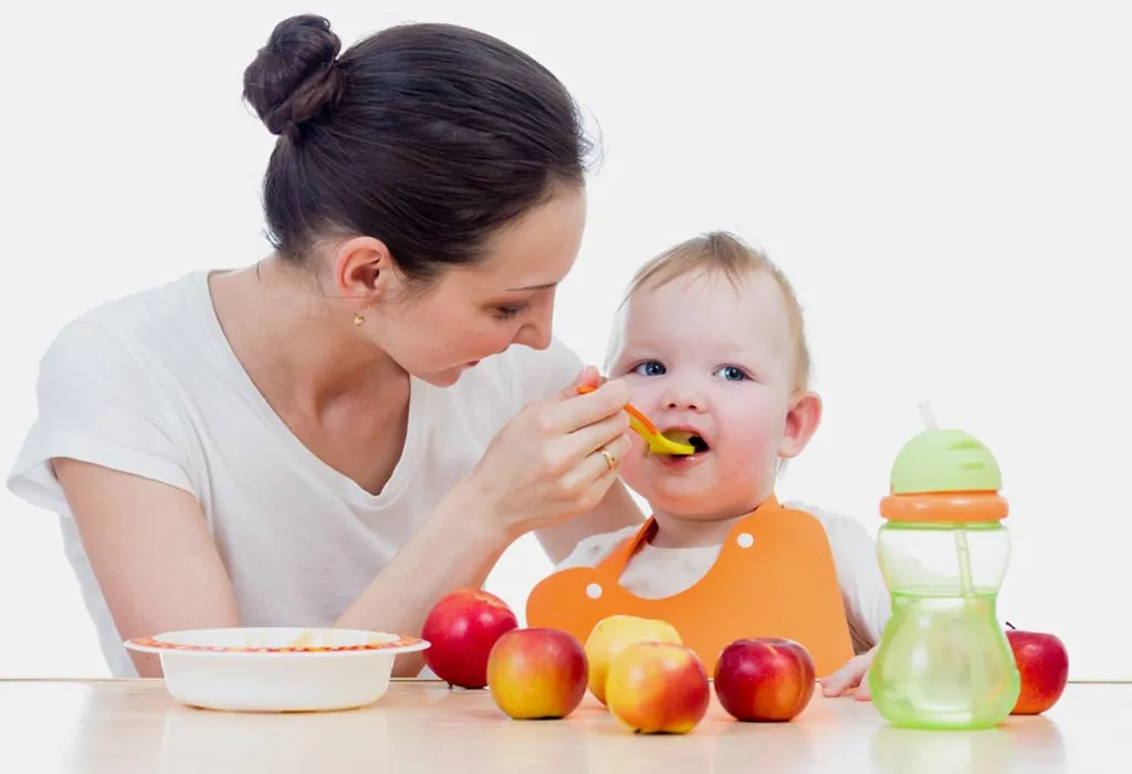 Feeding apple to babies