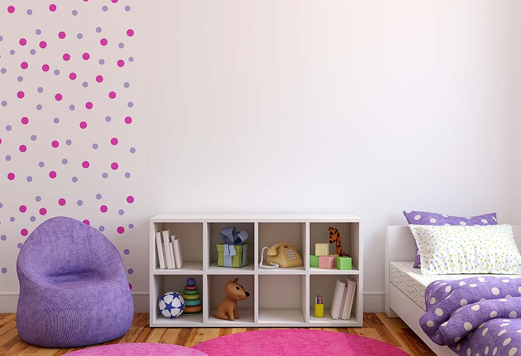 A small bookcase in a baby's room