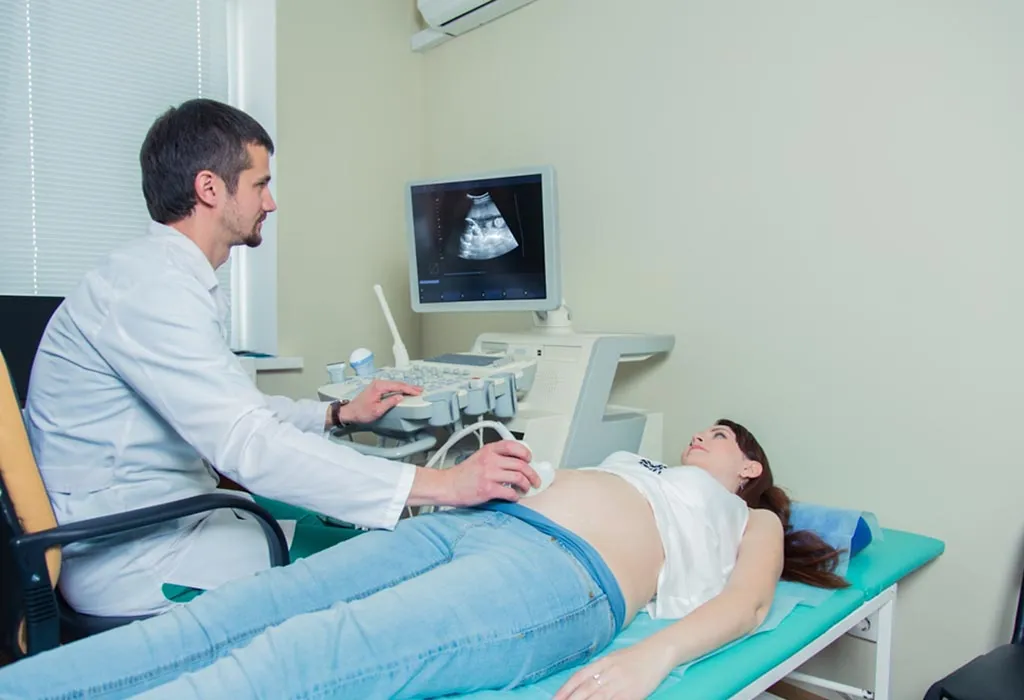 16 weeks pregnant woman getting ultrasound