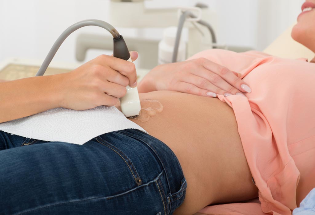 A woman undergoing an ultrasound during early pregnancy