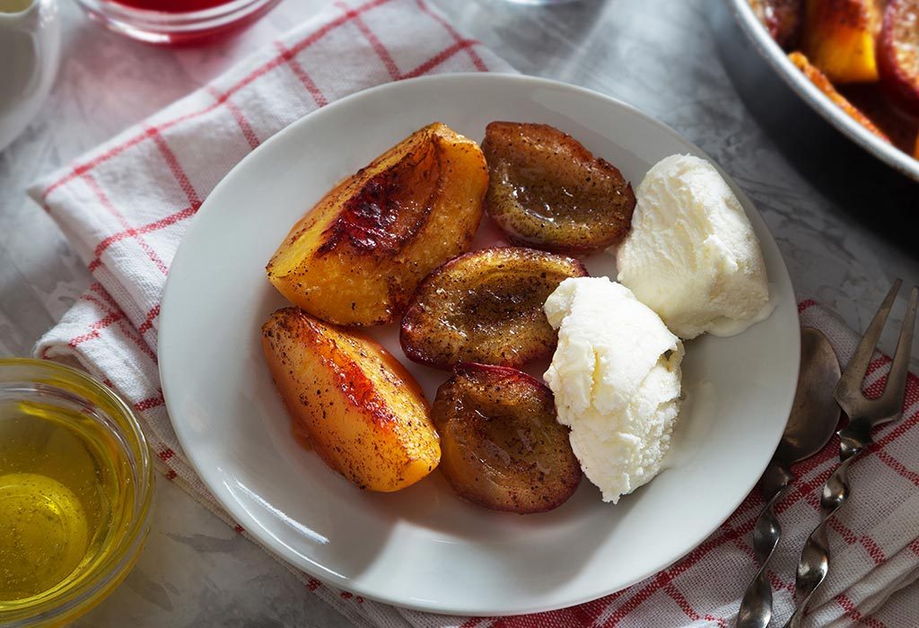 Baked Plums Garnished With Cinnamon