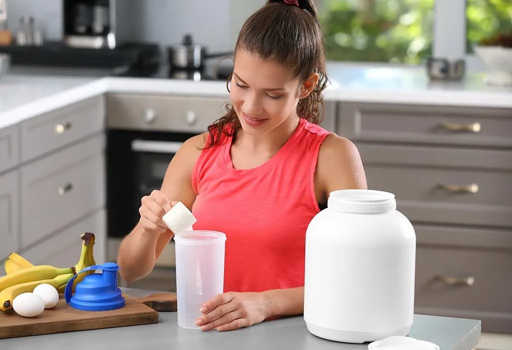 A woman drinking protein shake