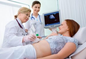 A woman getting an ultrasound in pregnancy