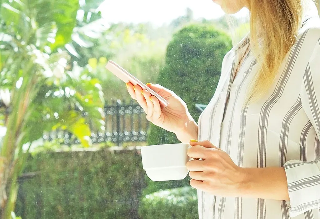 Lady wearing comfortable clothes and having tea