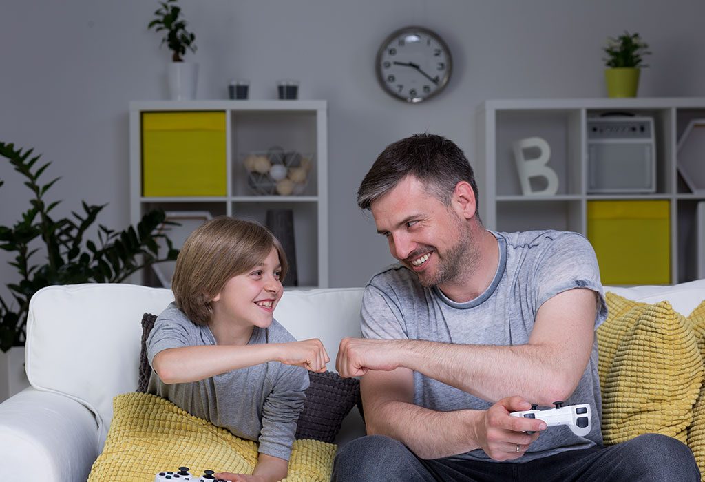 A father and son playing video games