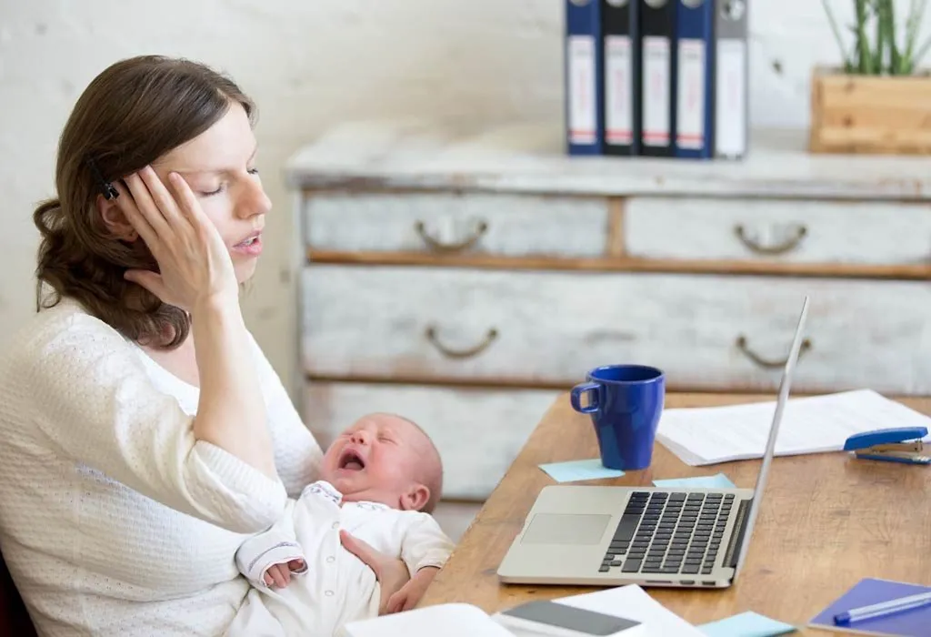 A new mother managing her baby and work