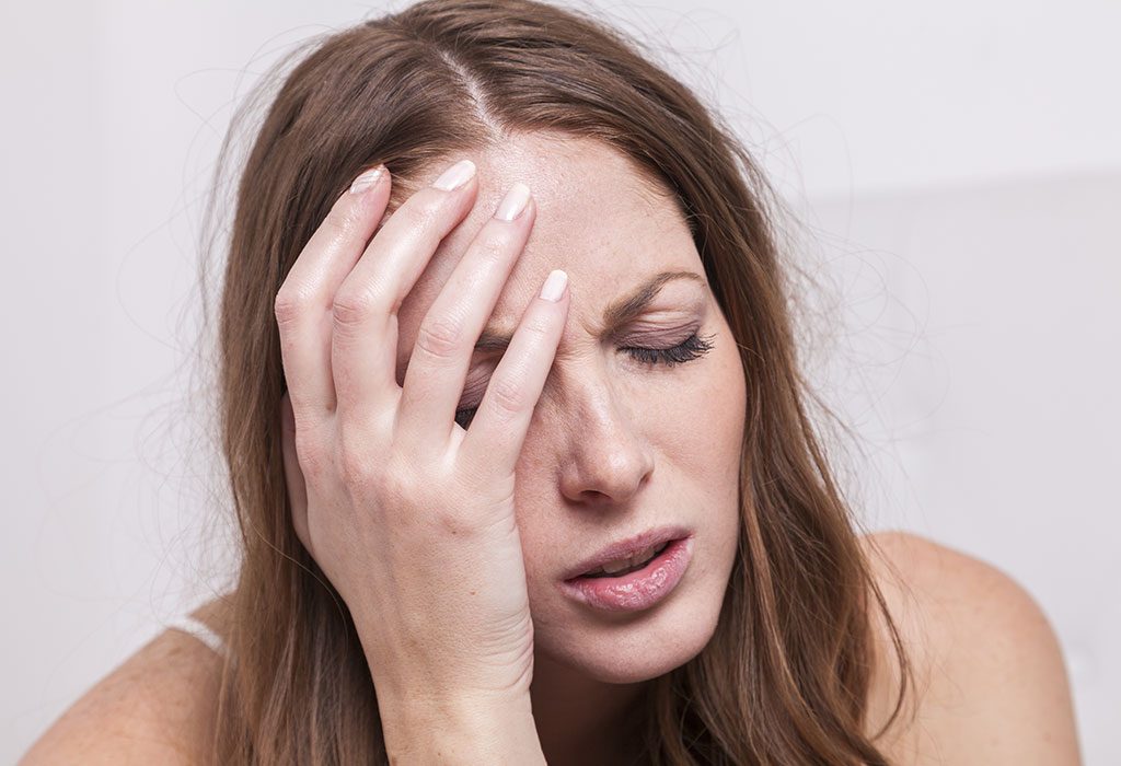 Woman experiencing side-effects of contraceptives