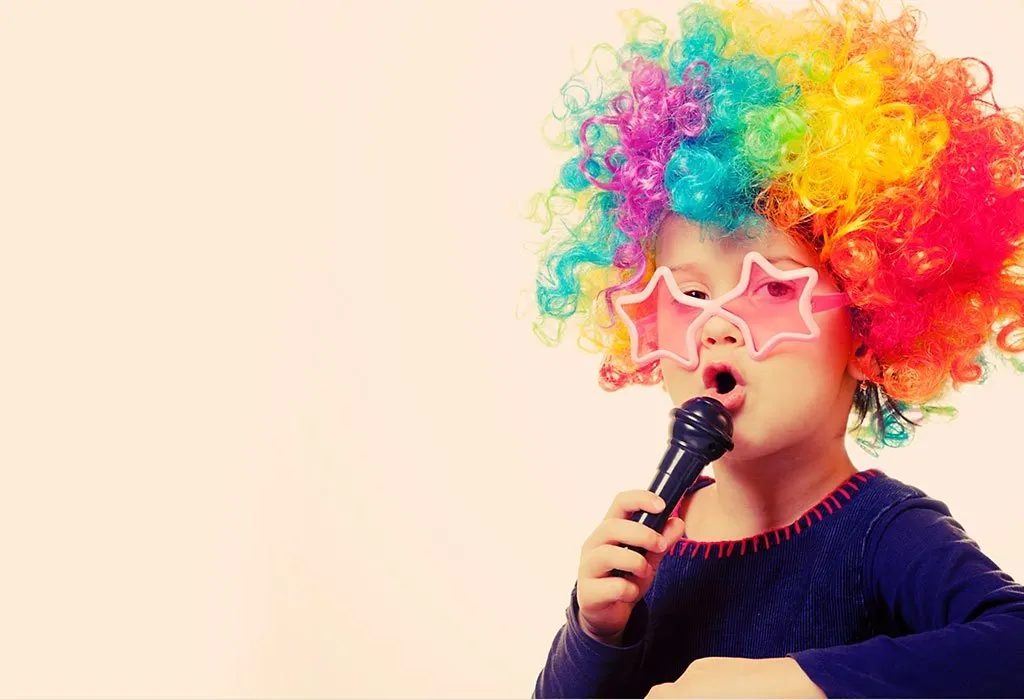 A kid playing with a microphone