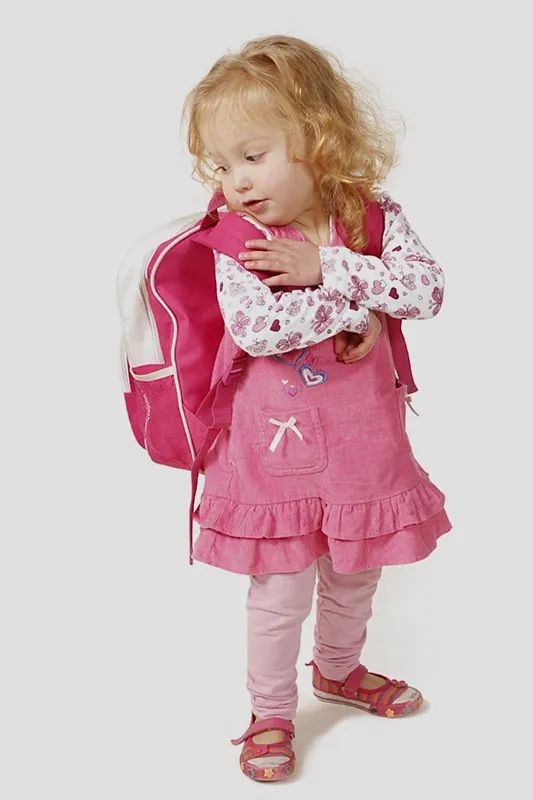 A girl with a school bag