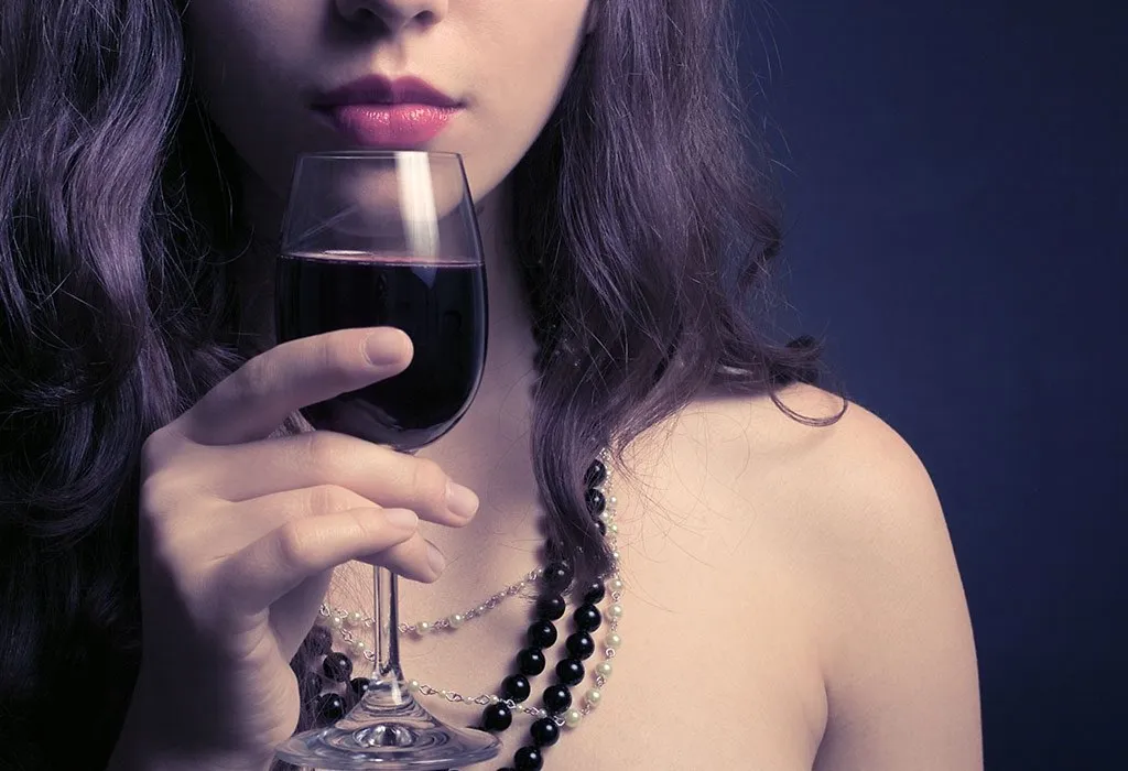 A woman drinking wine