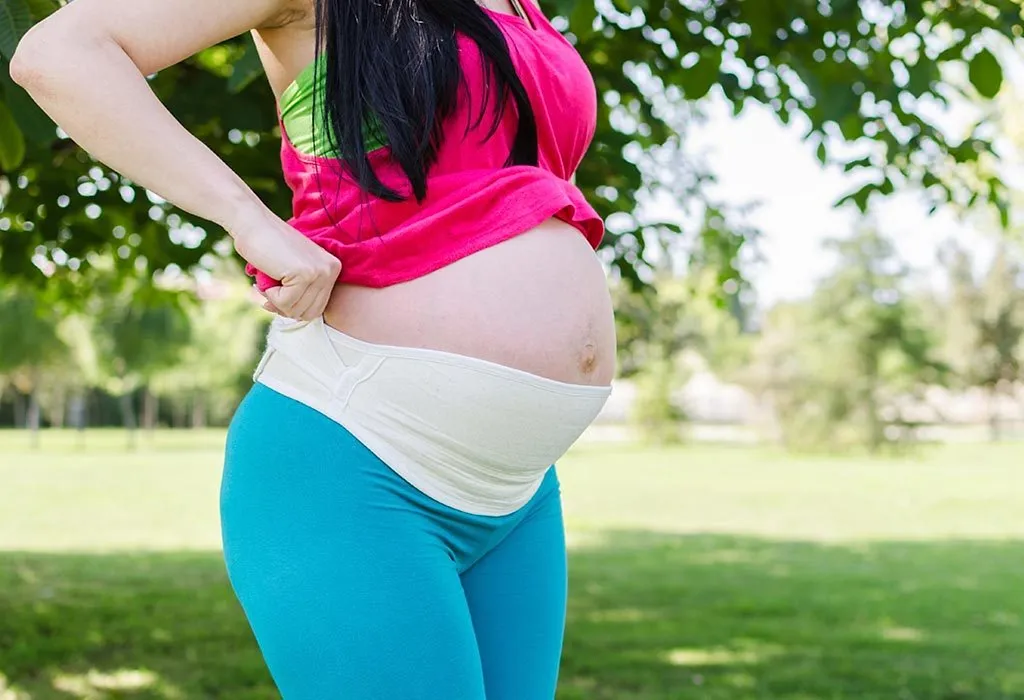 Woman wearing maternity belt