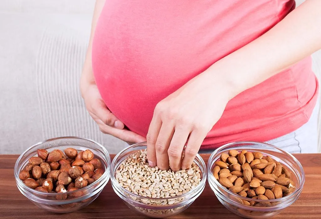 Pregnant woman snacking