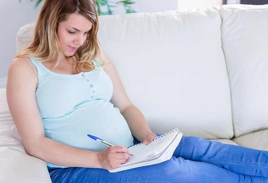 Pregnant Woman Writing