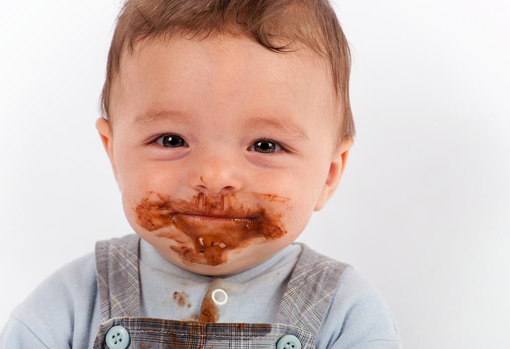Baby eating sweets