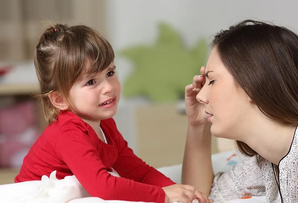 Fed-up mother with cranky toddler