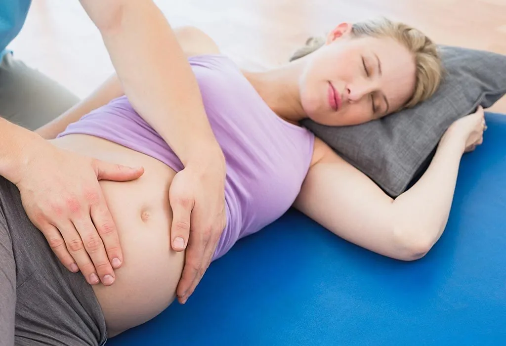 A woman takes a prenatal massage