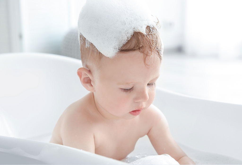 Baby with shampoo on the head