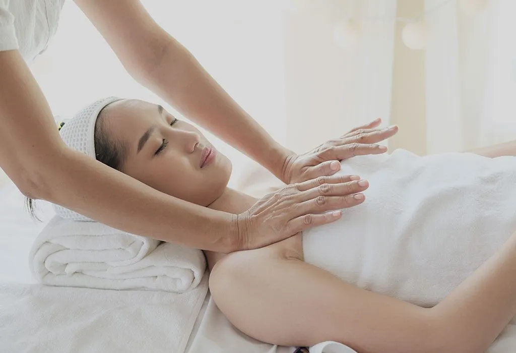 A woman getting a breast massage