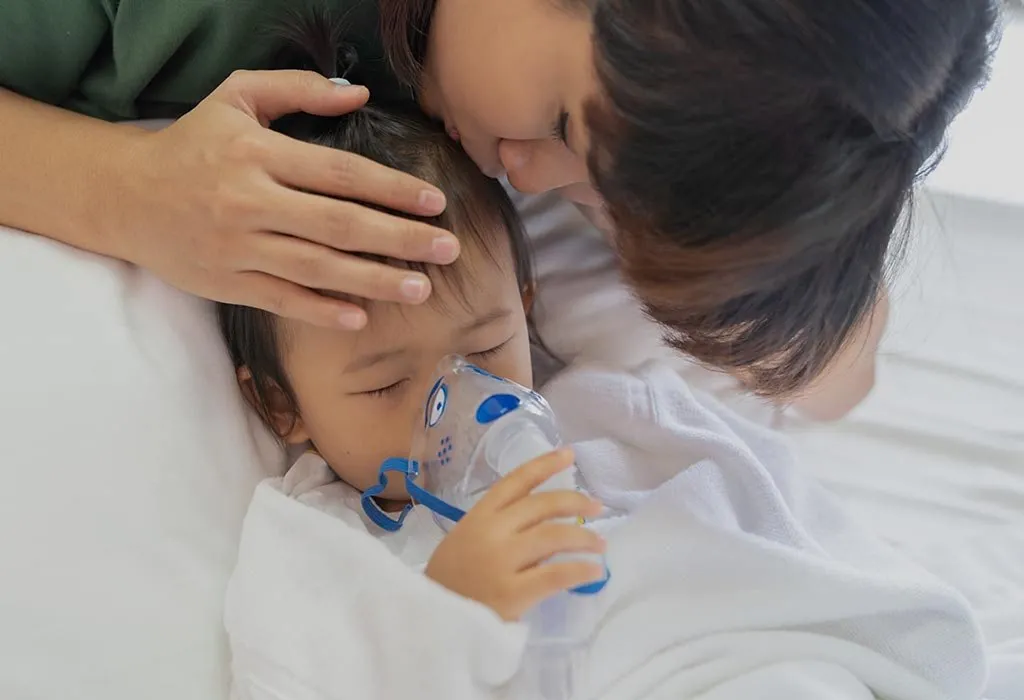 Mother comforts child with pneumonia